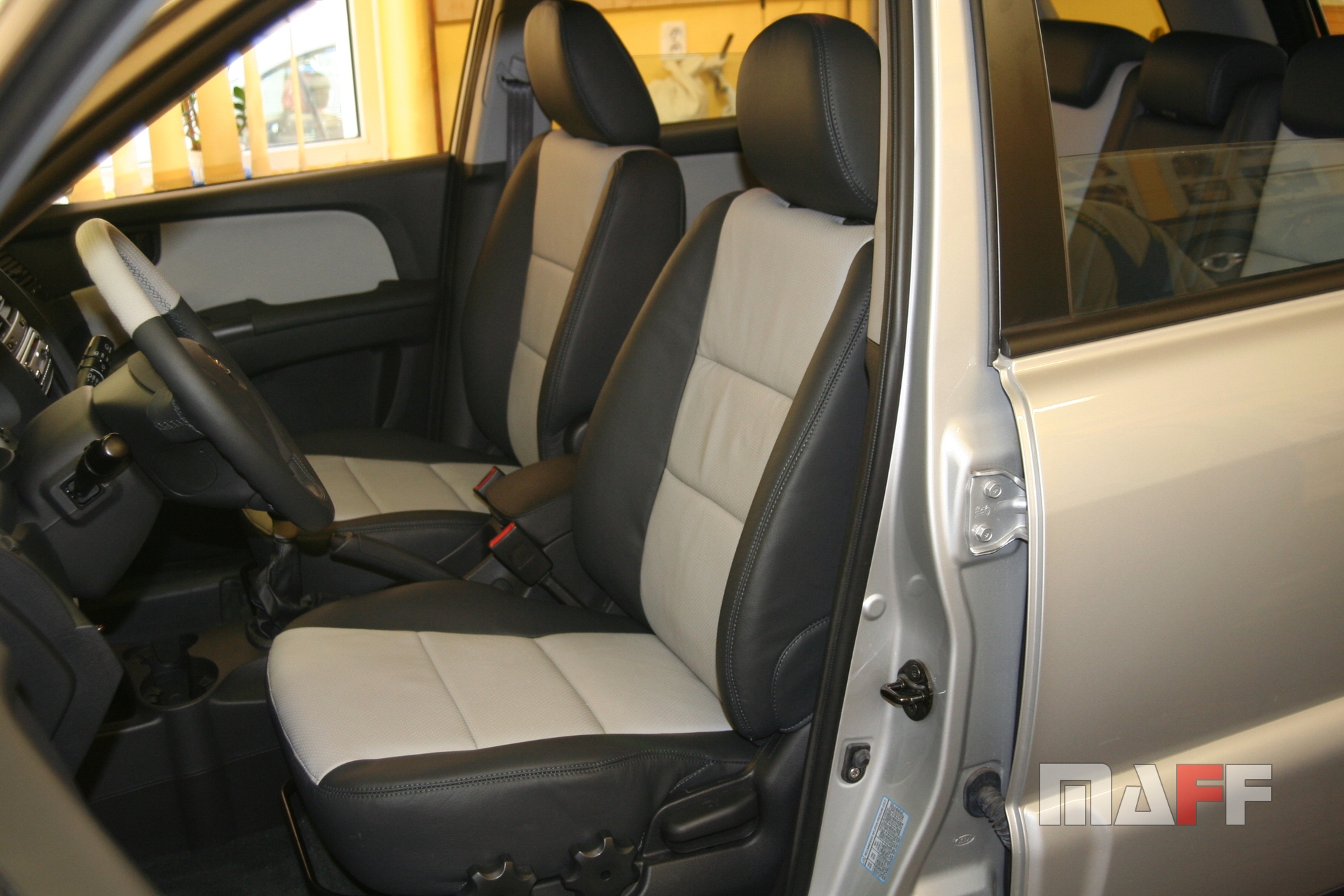 Tapicerka samochodowa Kia Sportage - 7